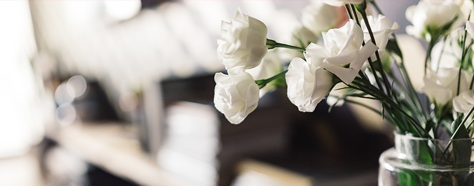 Lovely white flowers and cup of coffee